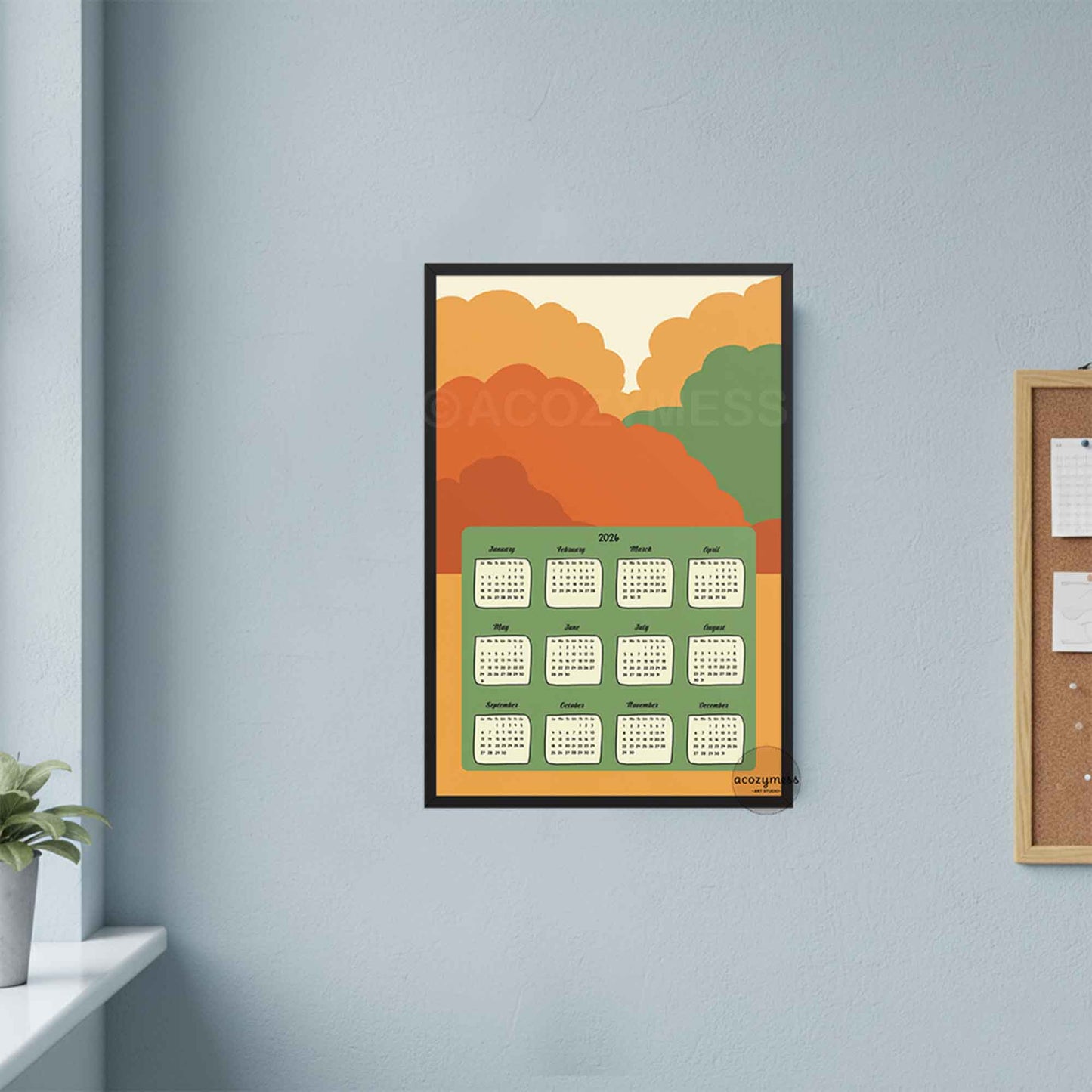 Framed calendar with colorful design on a light blue wall.