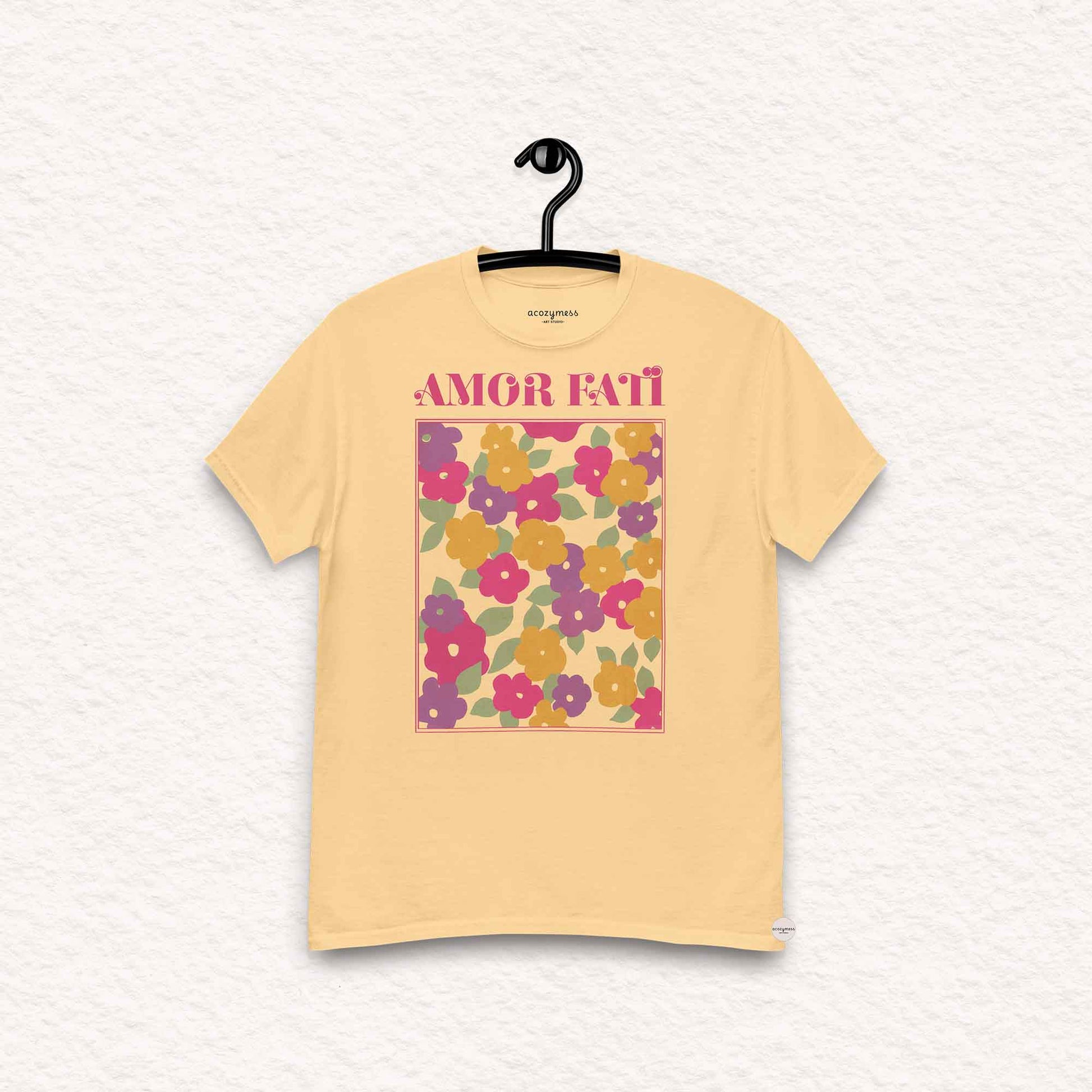 Amor Fati tshirt with pink floral abstract design in light yellow color