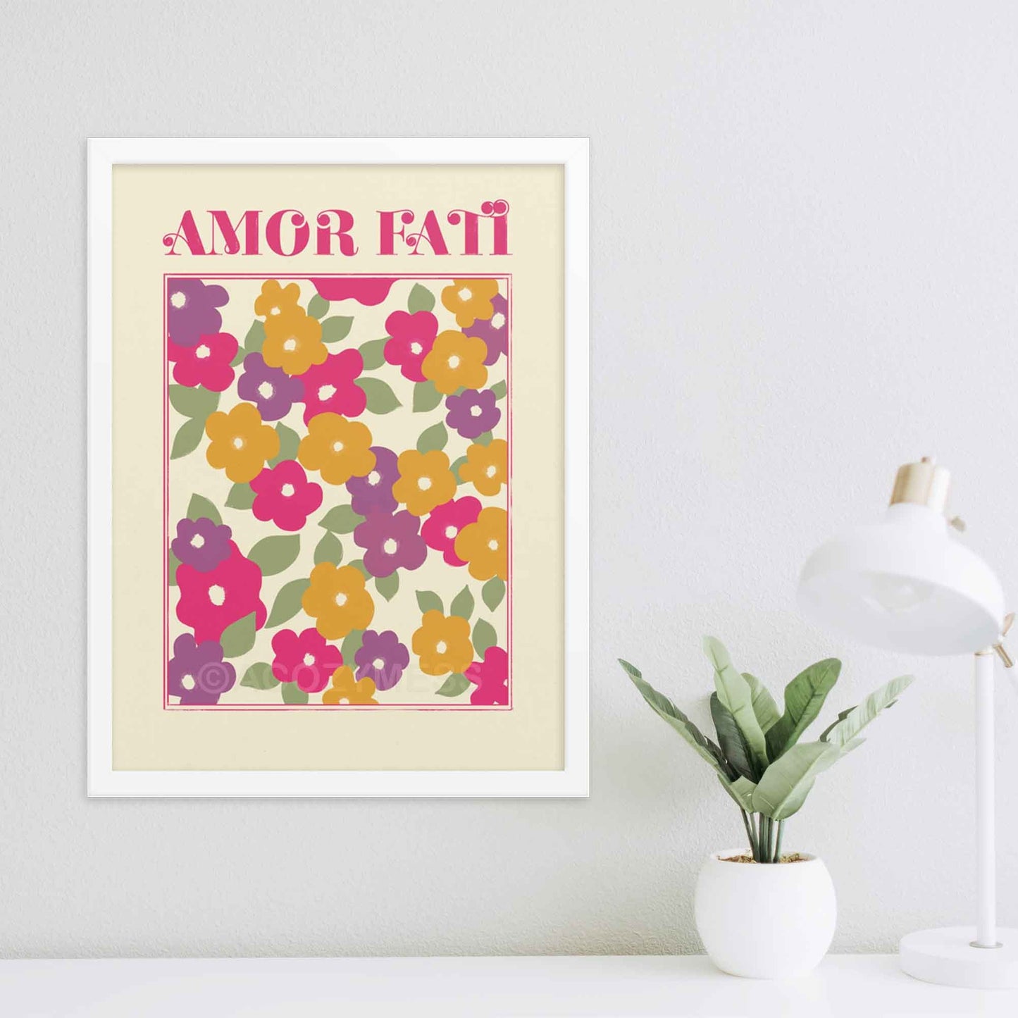 Amor Fati Abstract Floral Design Art Poster featuring pink, purple, yellow, and green hues in an abstract floral arrangement on a light beige background, with the phrase Amor Fati; meaning love of one fate, in white frame