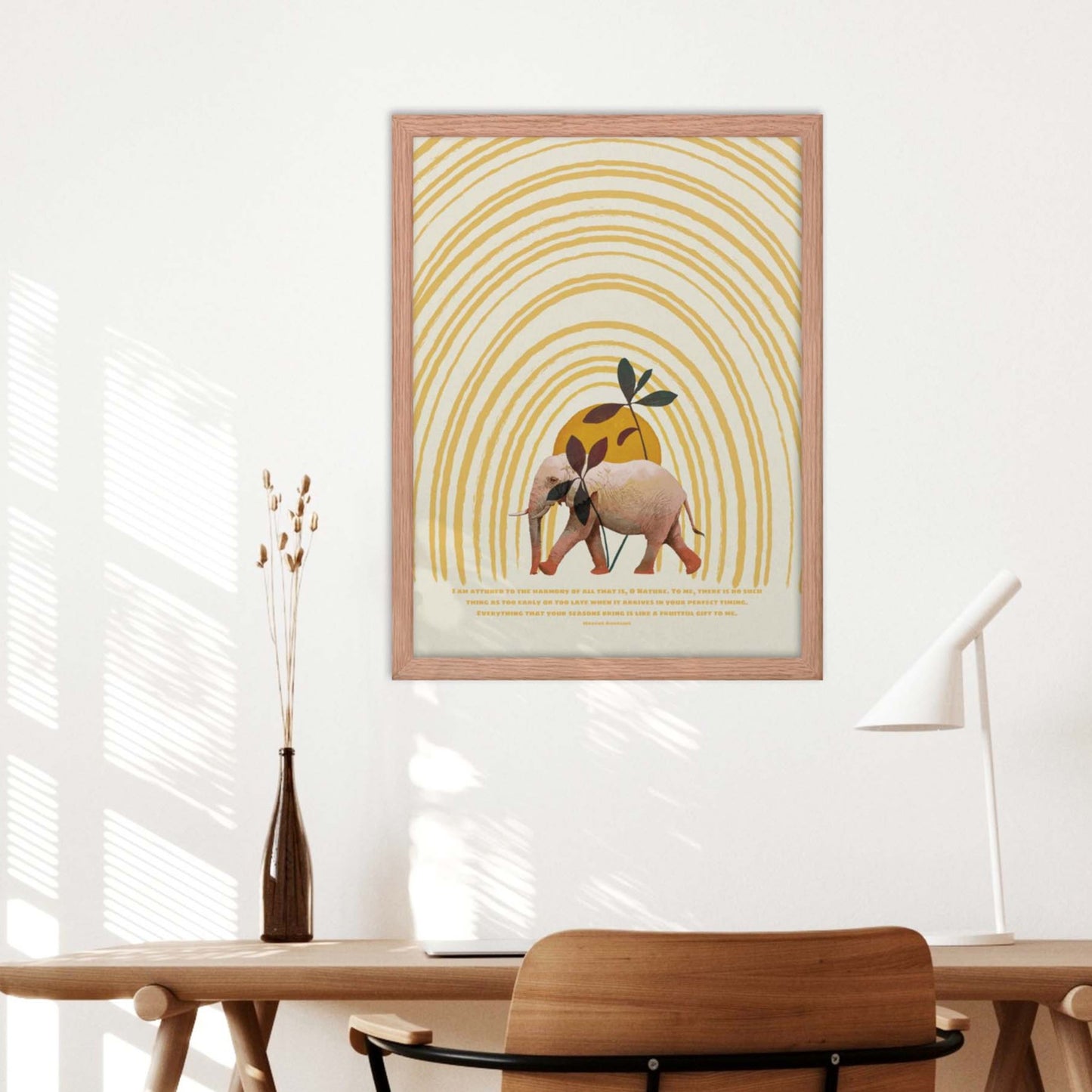 Marcus Aurelius poster with a quote on being attuned with nature, featuring an elephant in a sunny tropical scene, displayed in a oakwood frame.