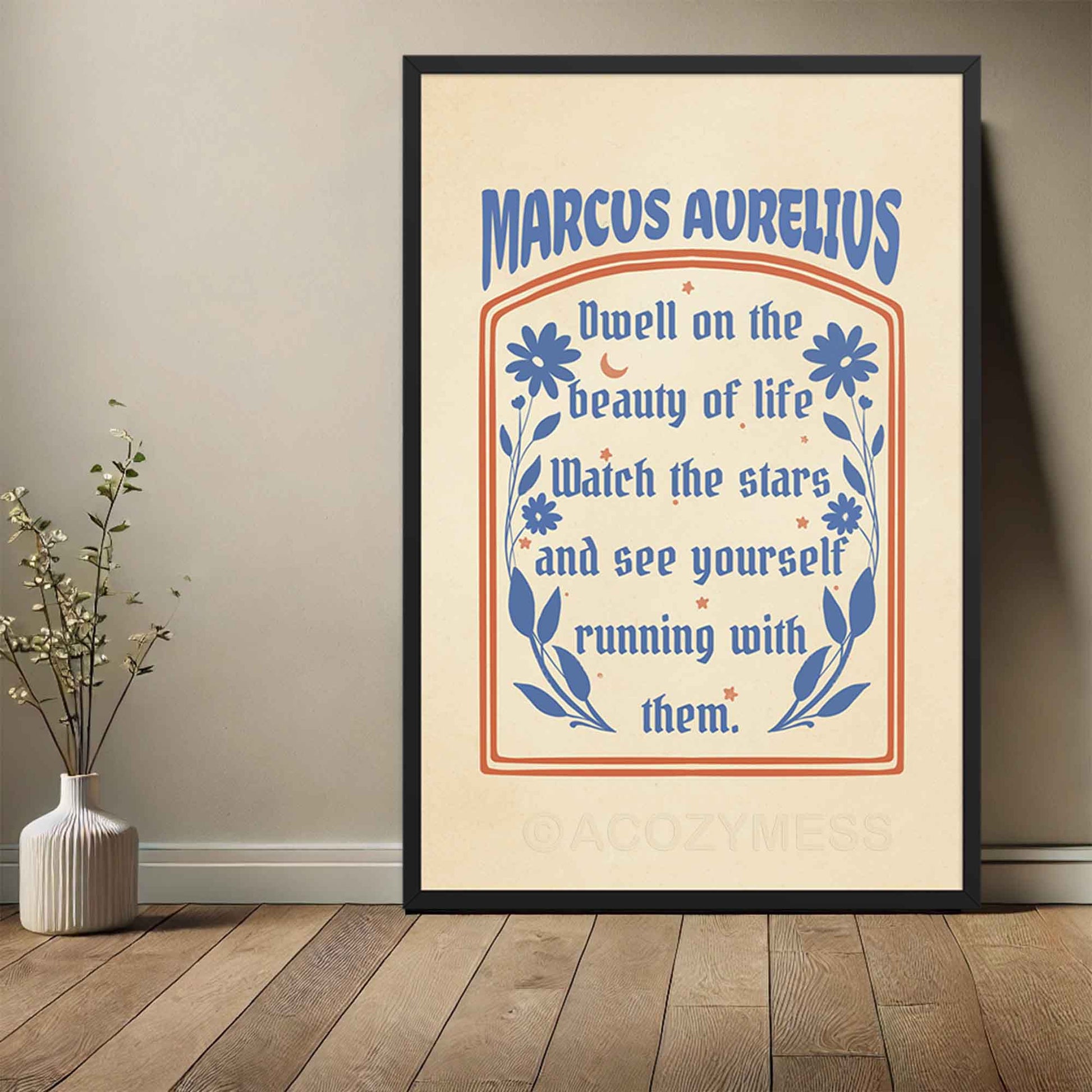 Stoic poster displayed in black frame featuring the Marcus Aurelius quote, Dwell on the beauty of life, in elegant typography.