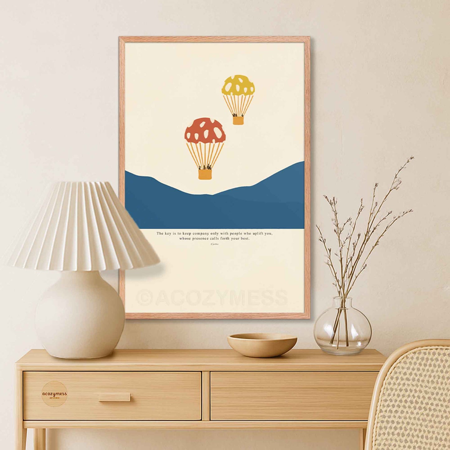 Epictetus philosophy poster with hot air balloons illustration displayed in an oakwood frame, warm and natural finish.