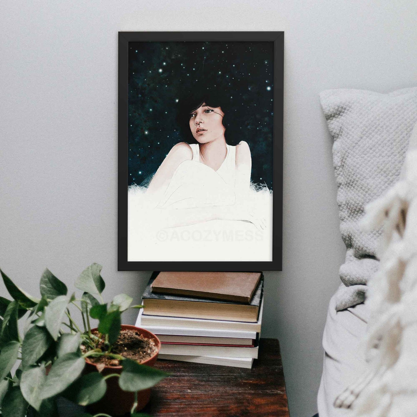 Girl Dreaming Awake at Night art print, created with a soothing blue, white, and pink palette using watercolors and iPad, perfect for adding a dreamy, tranquil vibe to your bedroom wall in black frame.