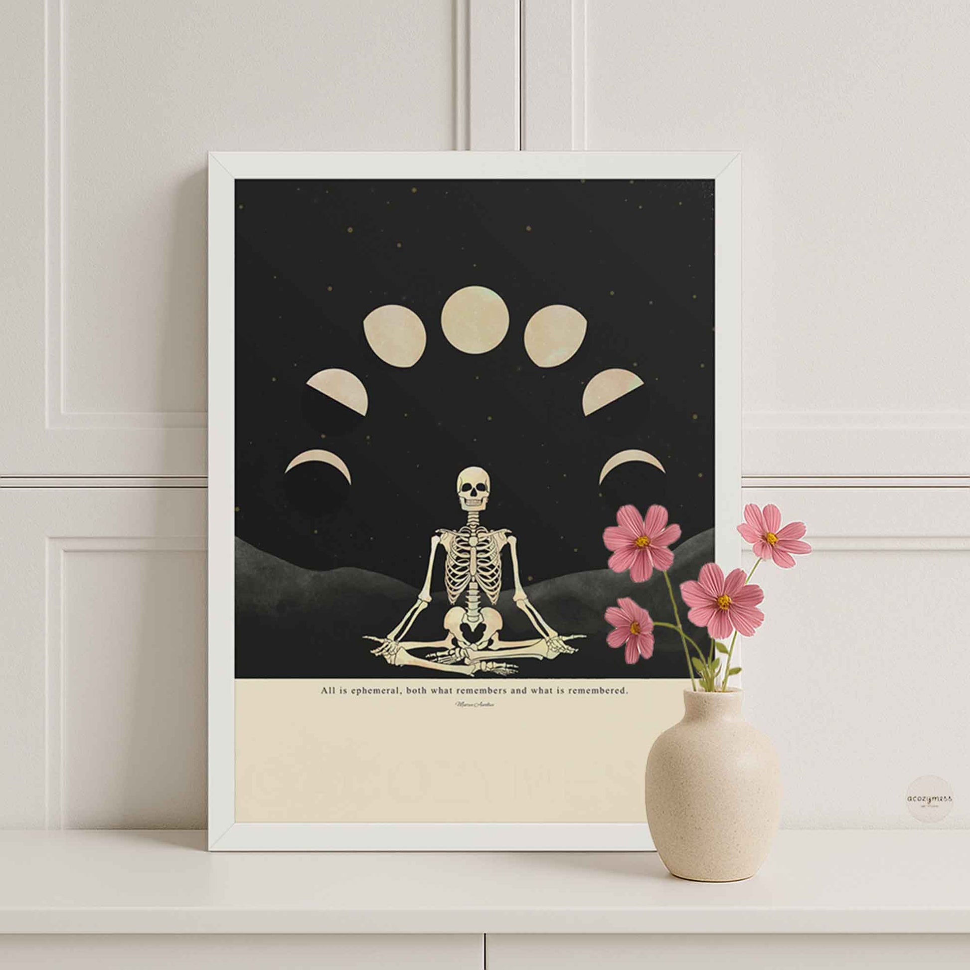 Marcus Aurelius quote poster in white wooden frame, featuring ‘All is ephemeral...l’ with skeleton and moon phase illustration on beige background, minimalist stoic wall art.