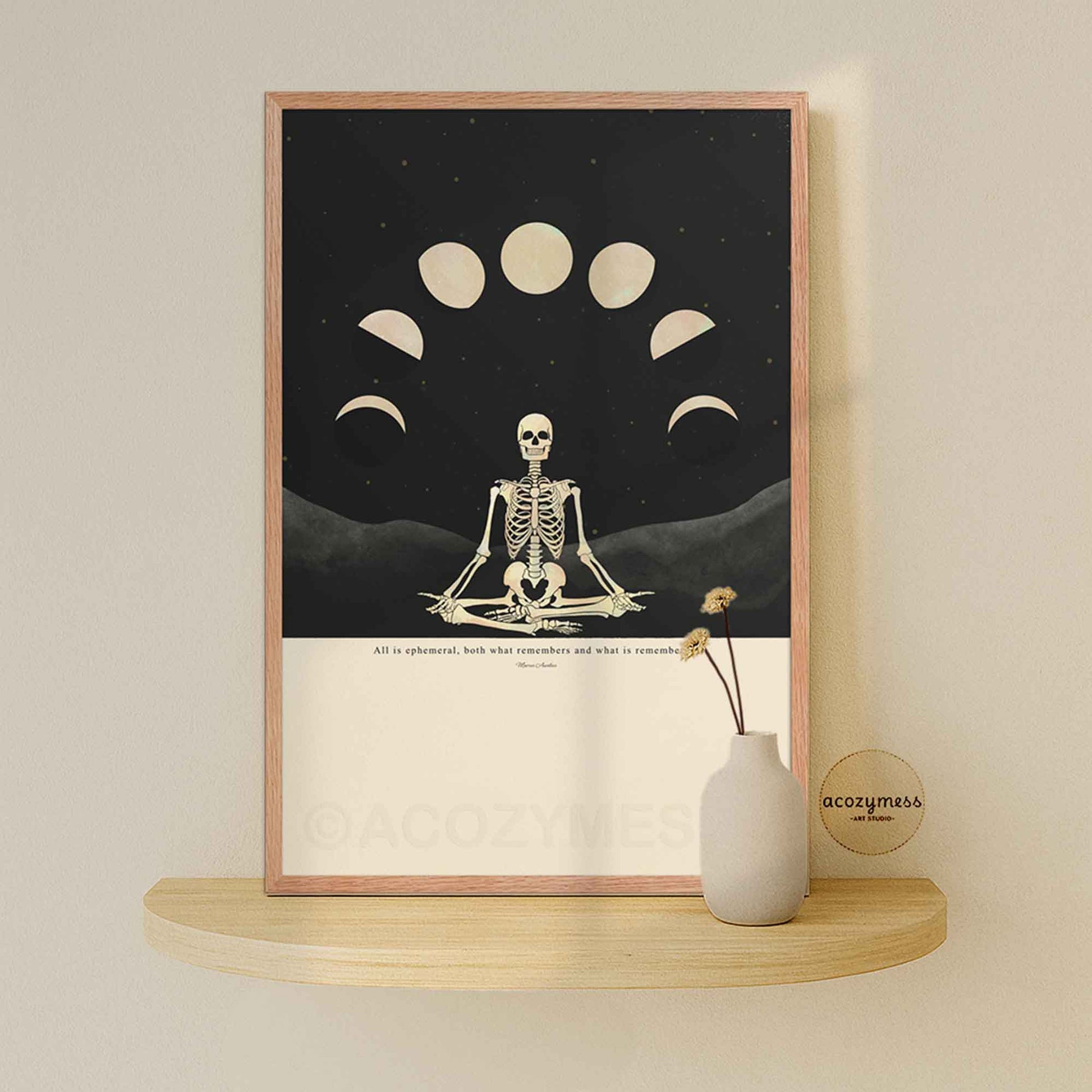 Oak-framed stoic wall art featuring Marcus Aurelius quote with detailed skeleton and moon phase artwork on soft beige background.