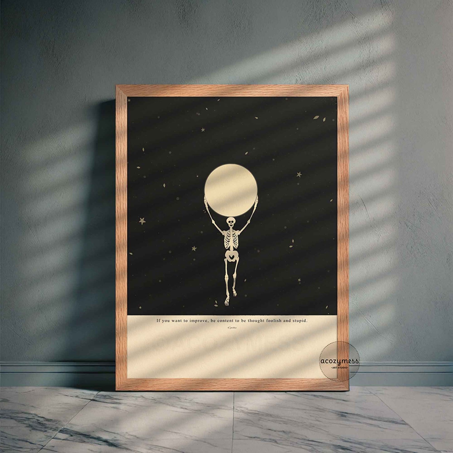 Oak-framed stoic wall art featuring Marcus Aurelius quote with detailed skeleton and moon phase artwork on soft beige background, ideal for thoughtful home