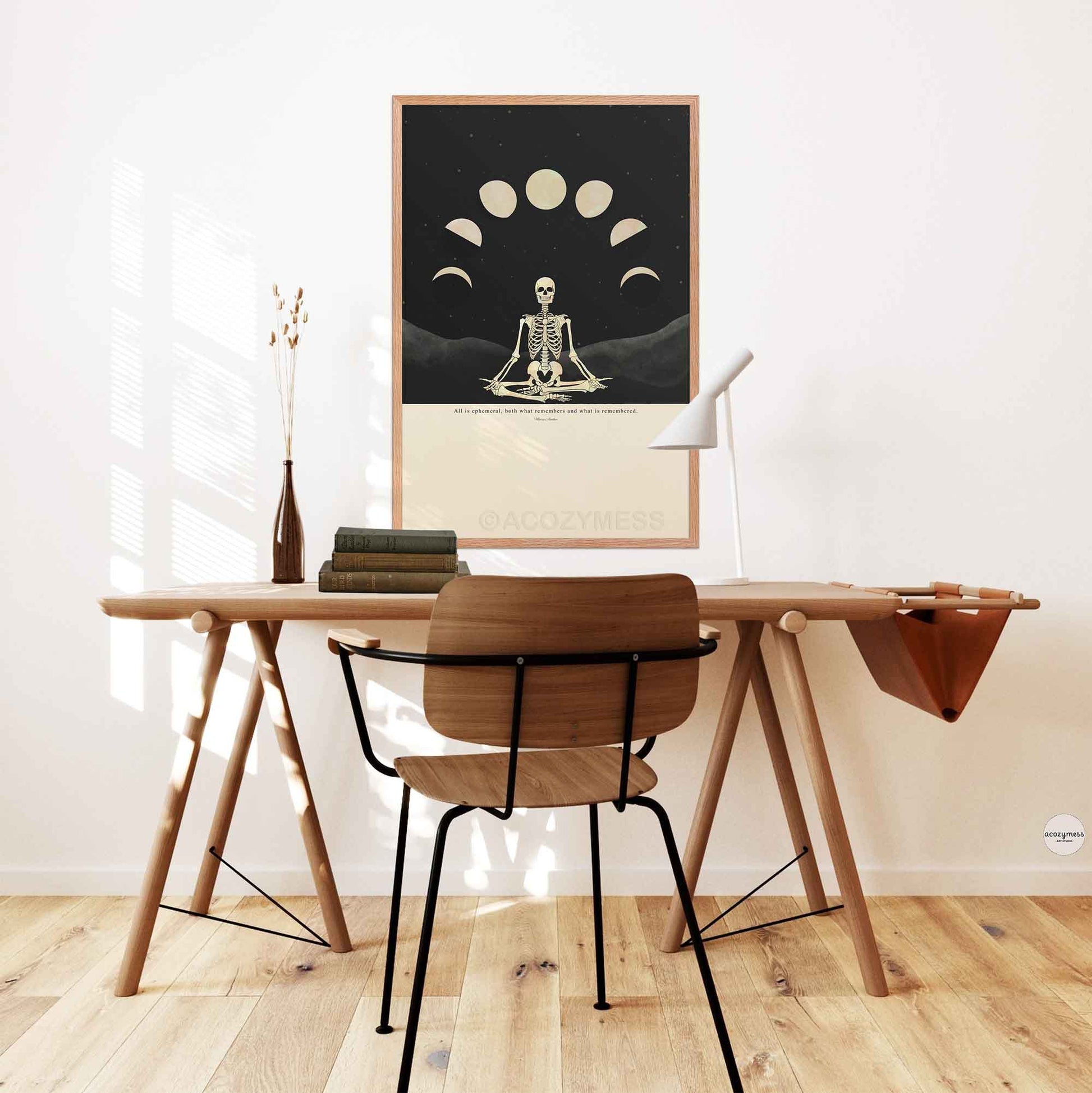 Oak-framed stoic wall art featuring Marcus Aurelius quote with detailed skeleton and moon phase artwork on soft beige background, ideal for thoughtful home or study decor