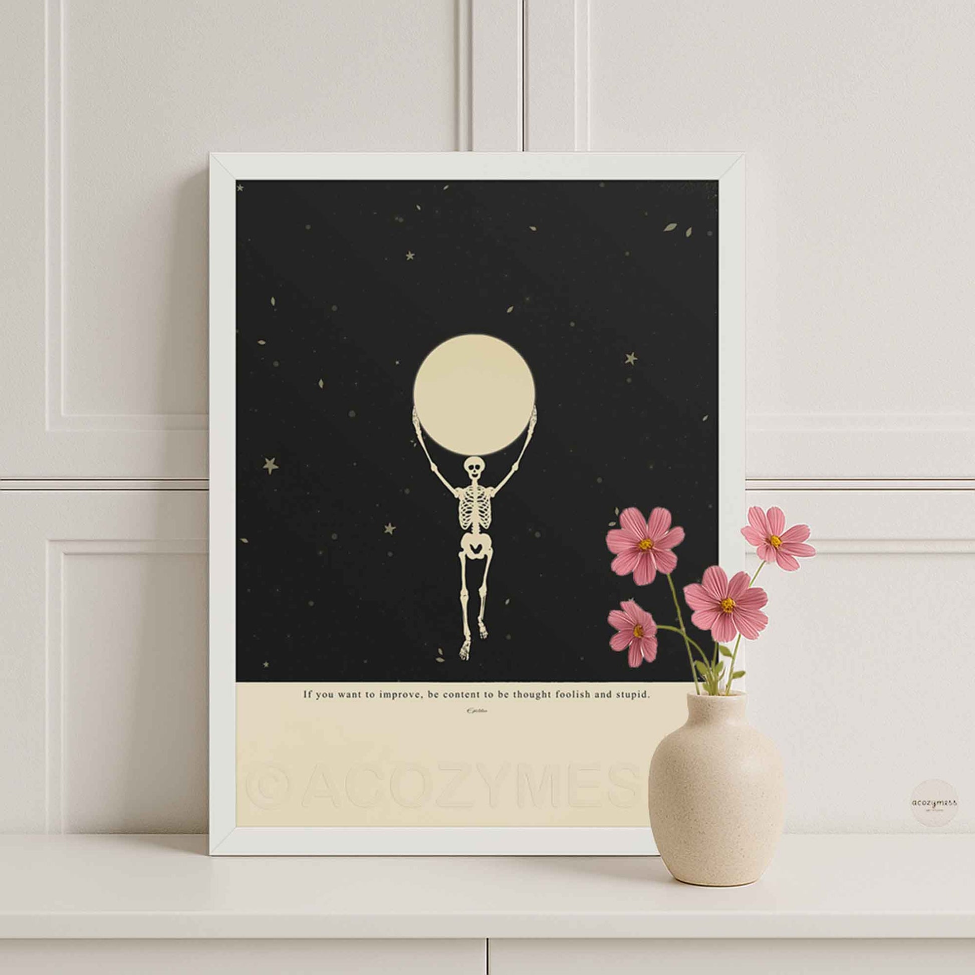 Epictetus quote poster in white wooden frame, featuring surreal artwork of skeleton carrying the moon with stars in background and the quote ‘If you want to improve…’, minimalist stoic art print.