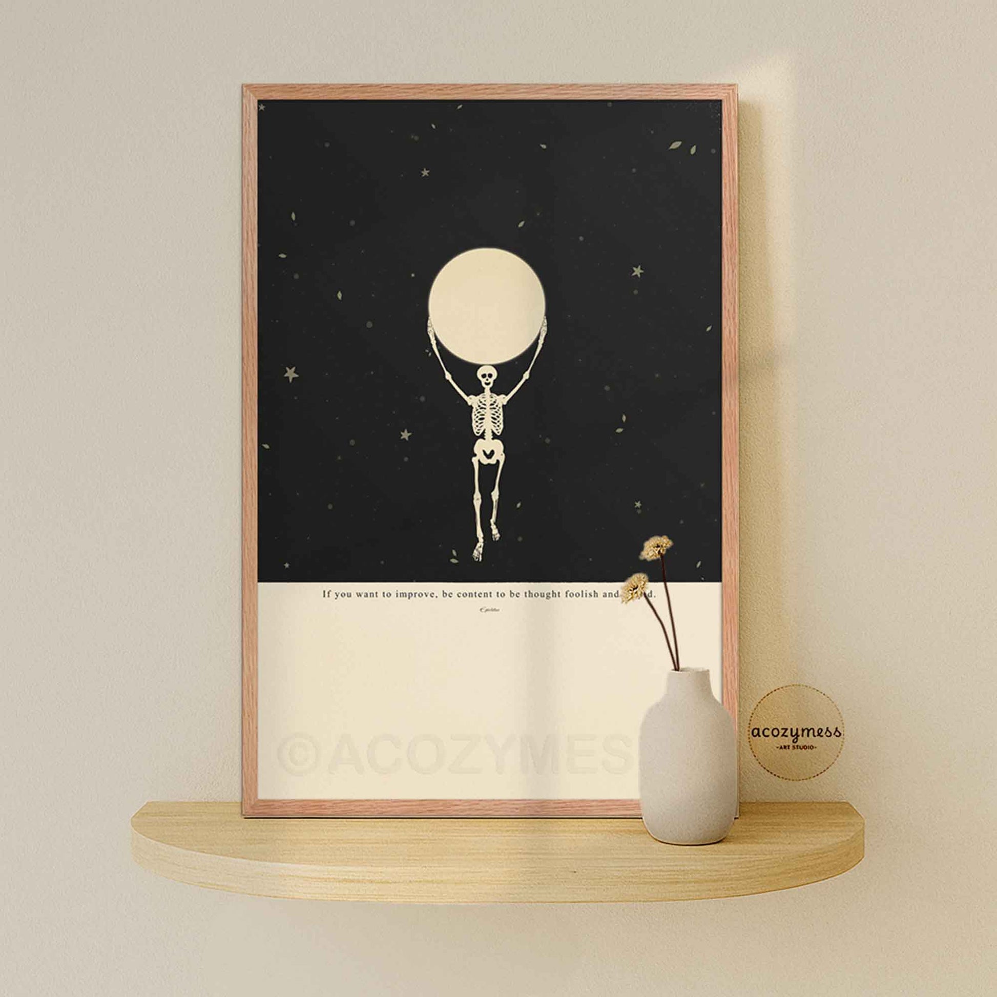 Oak-framed stoic quote poster with Epictetus saying and a symbolic skeleton and moon design over a beige and black starry background, printed for moody or dark academia-inspired decor.
