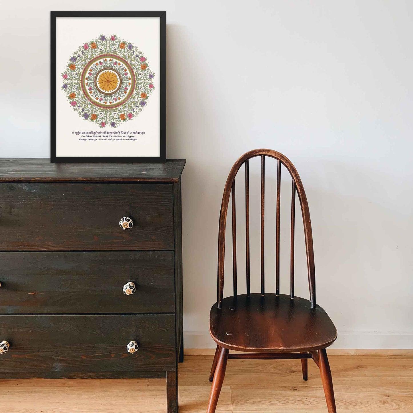 gayatri mantra print with colorful floral mandala art in black frame