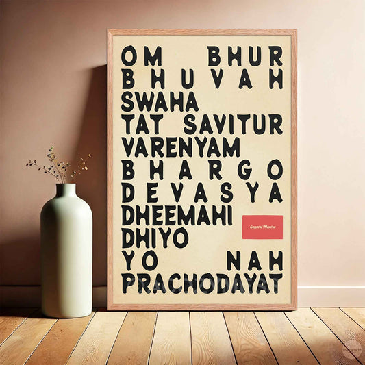 Gayatri Mantra poster in an oakwood frame, displayed on a wall for a natural and warm look.