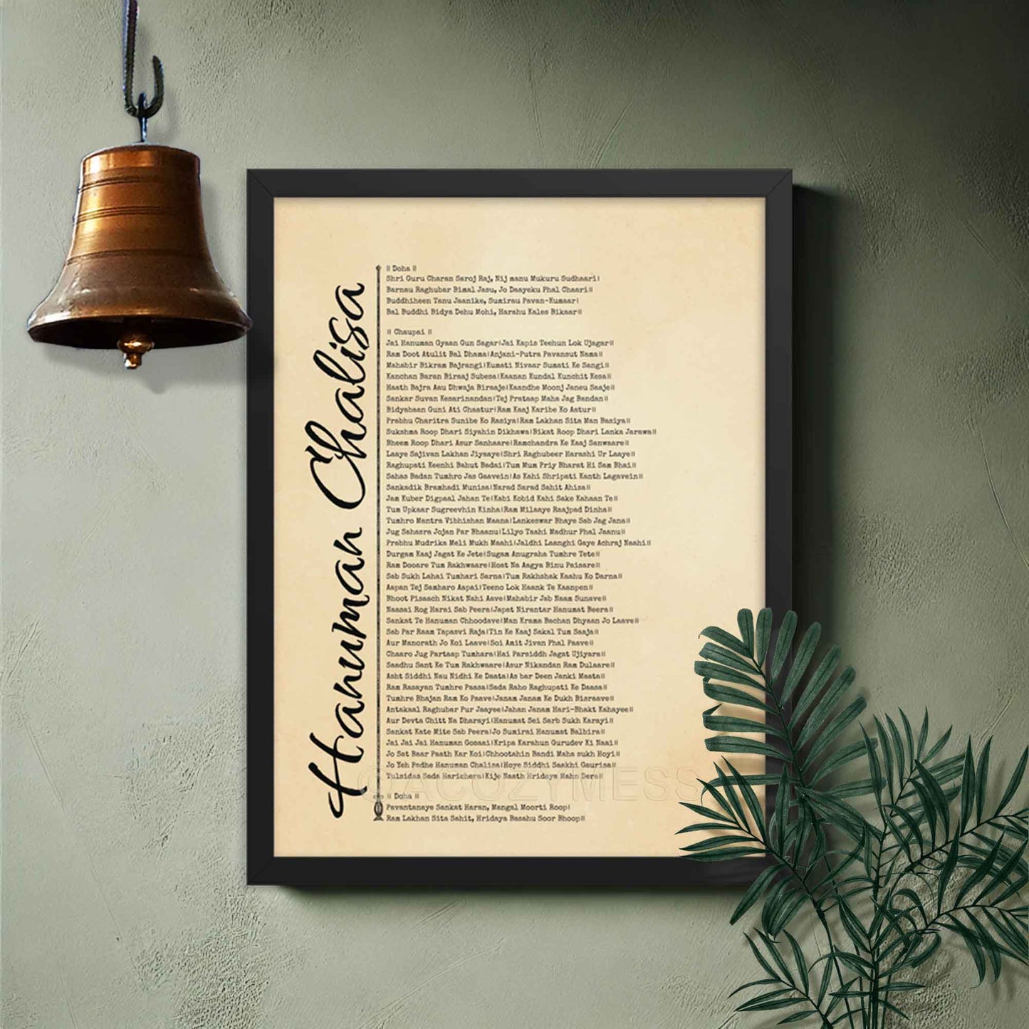 Hanuman Chalisa poster featuring the sacred devotional prayer, ideal for prayer rooms and meditation spaces, framed in black on a temple wall gallery.