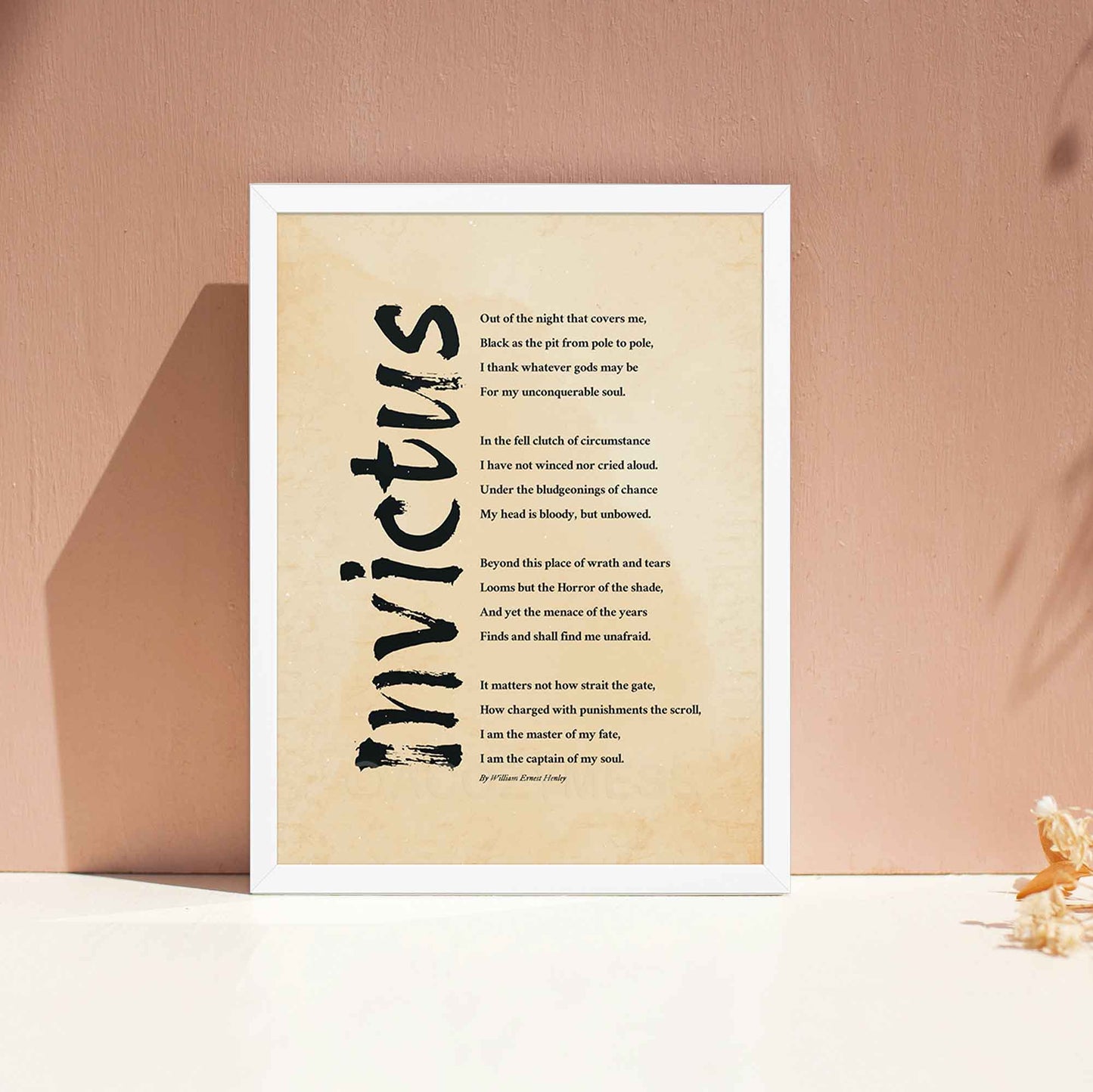 Invictus poem print on vintage style paper, in white frame.