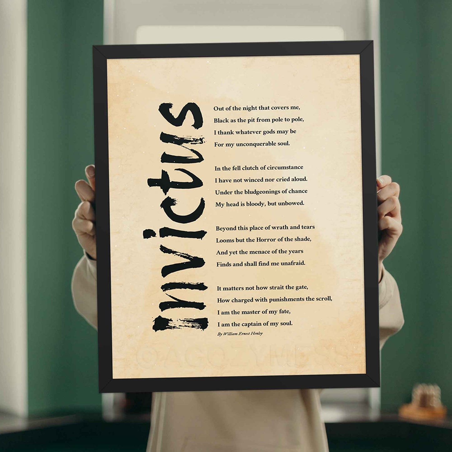 Invictus wall art on vintage style paper, in black frame.