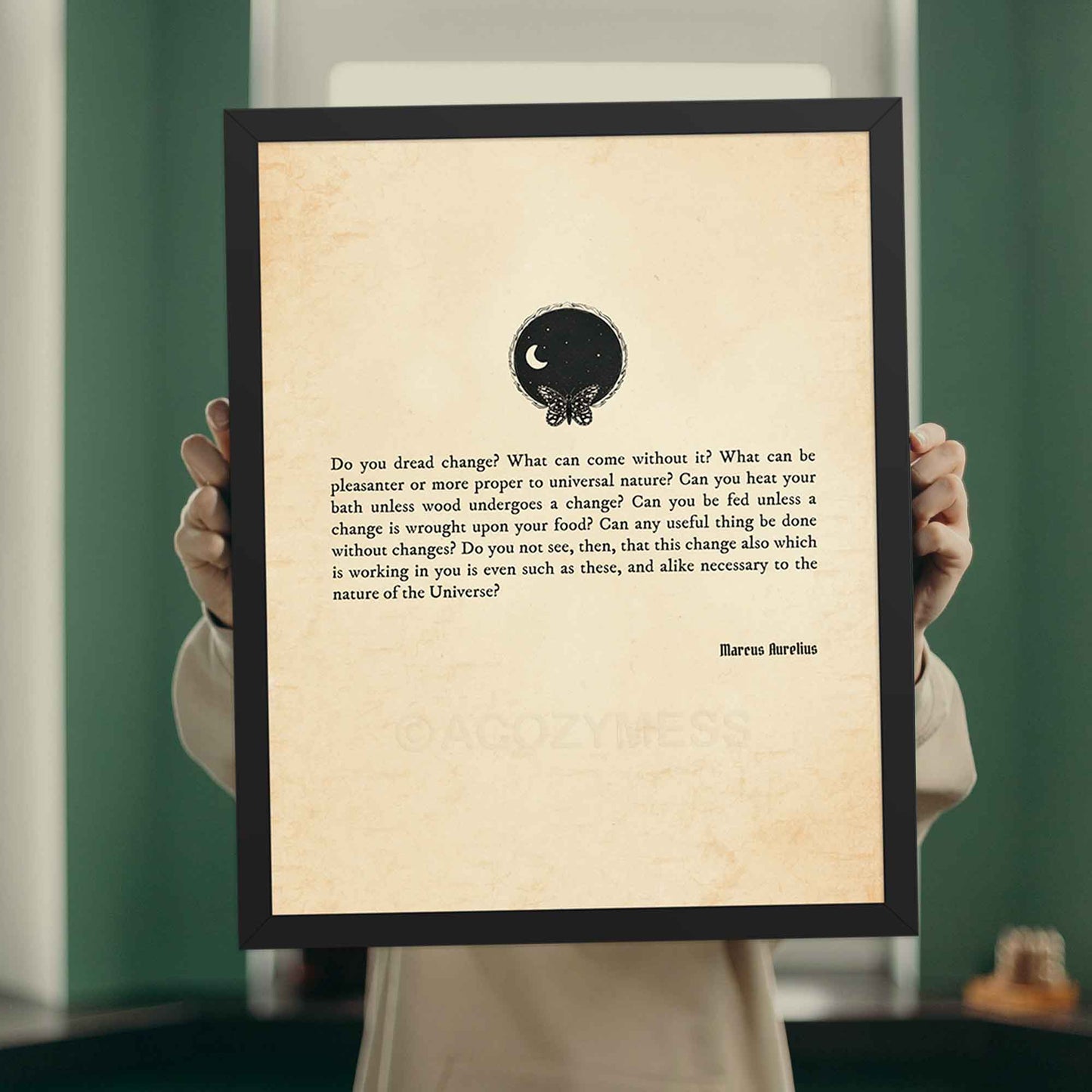A vintage-style stoic quote poster featuring a Marcus Aurelius quote on the inevitability of change, displayed on an aged paper background. The design includes a small black illustration of a butterfly and the universe, in black frame.