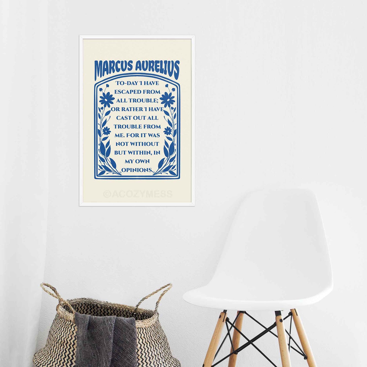 Marcus Aurelius print dark blue on cream with floral design, in white frame.