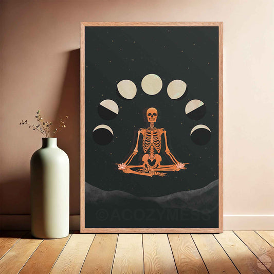 Meditating skeleton and moon phase artwork framed in oakwood, creating a rustic yet mystical feel.