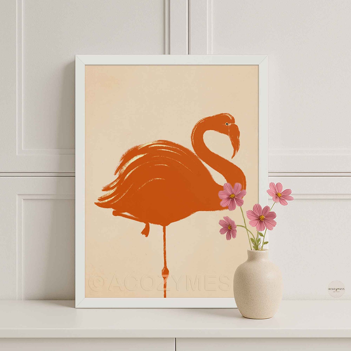 White Framed artwork of an orange flamingo on a beige background for fresh and clean look.