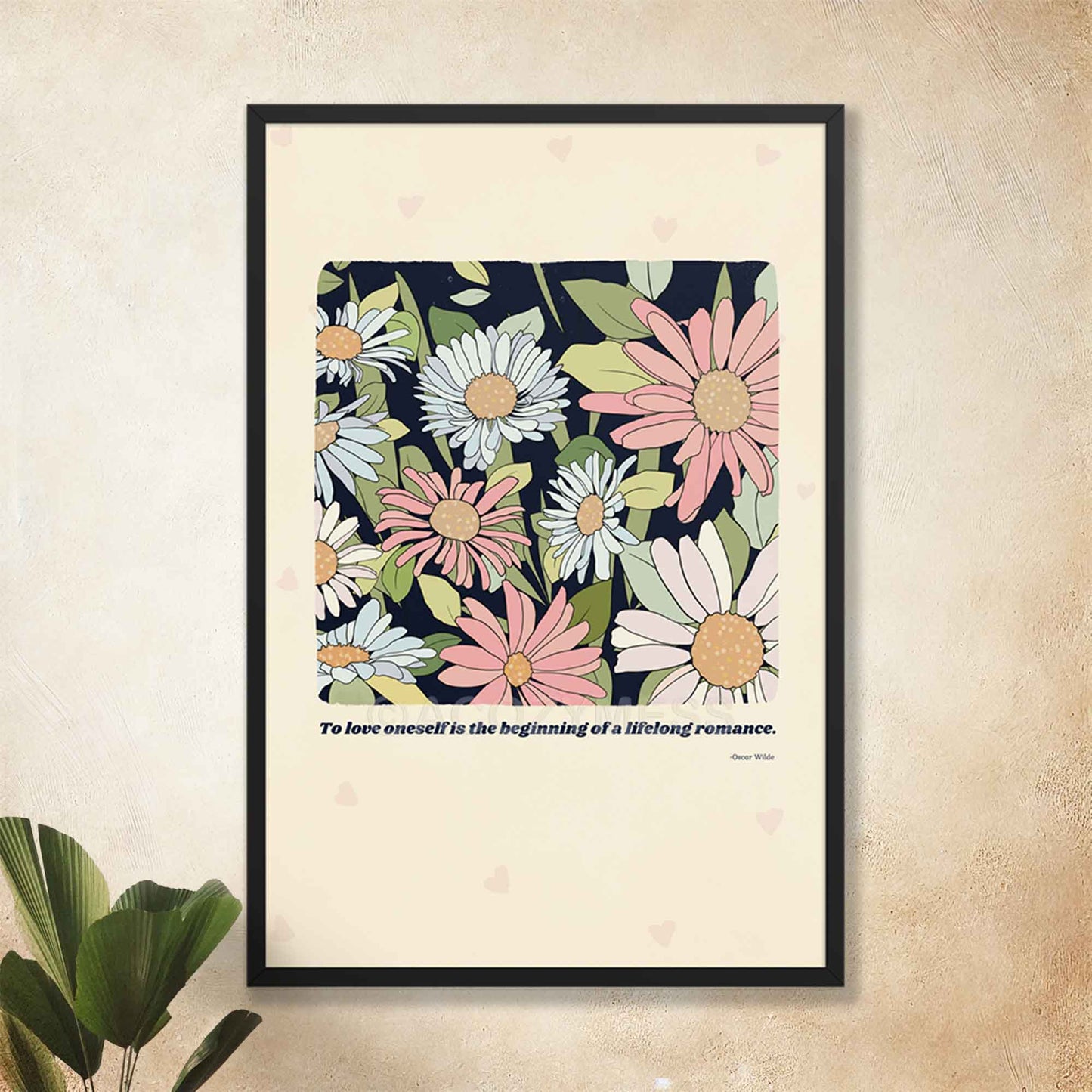 A beautifully designed poster featuring Oscar Wilde’s quote, "To love oneself is the beginning of a lifelong romance," paired with a delicate floral illustration, in black frame.