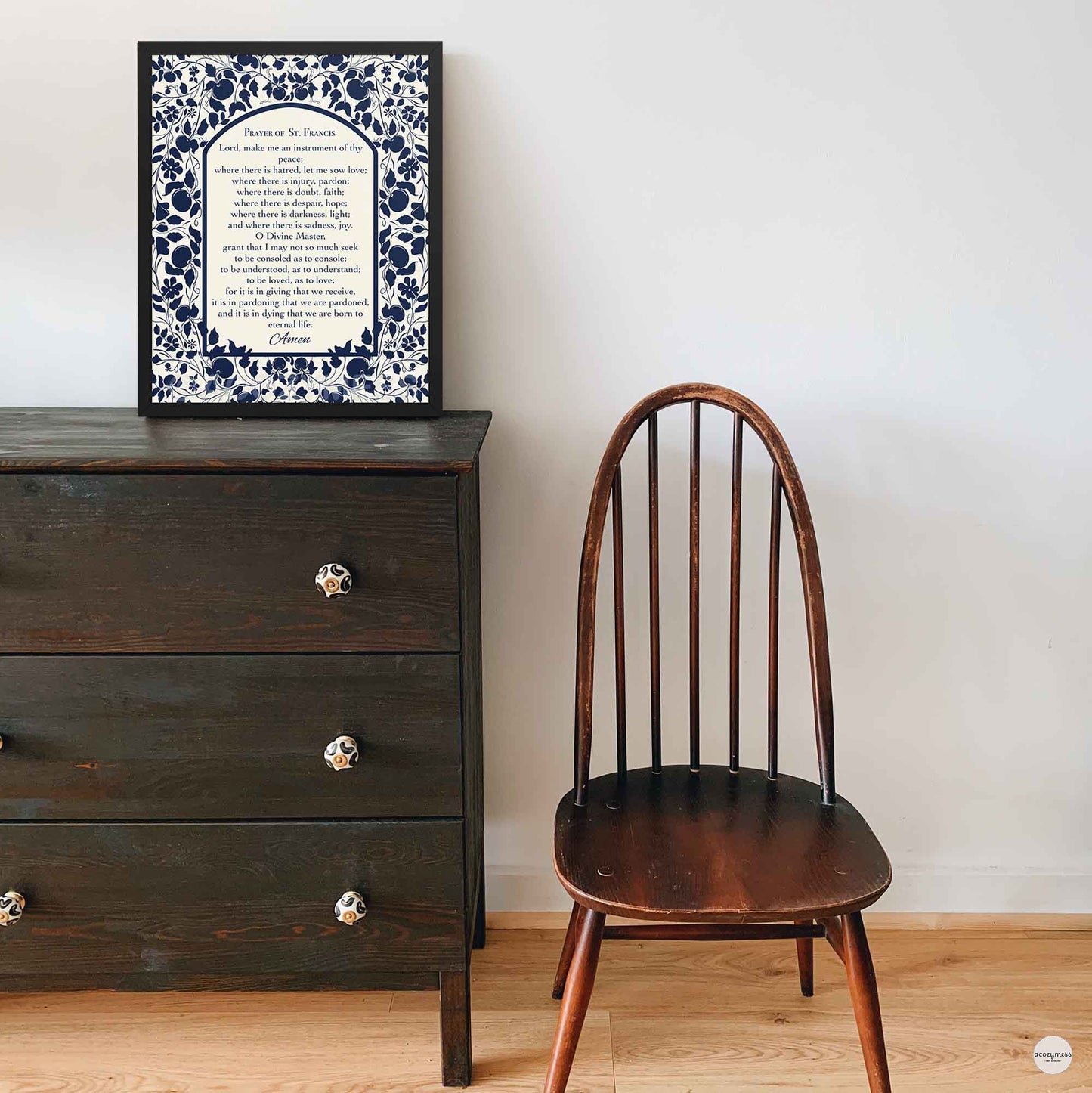 Prayer of St. Francis poster shown in a clean black frame, with elegant dark blue floral accents on a light beige background for prayer room