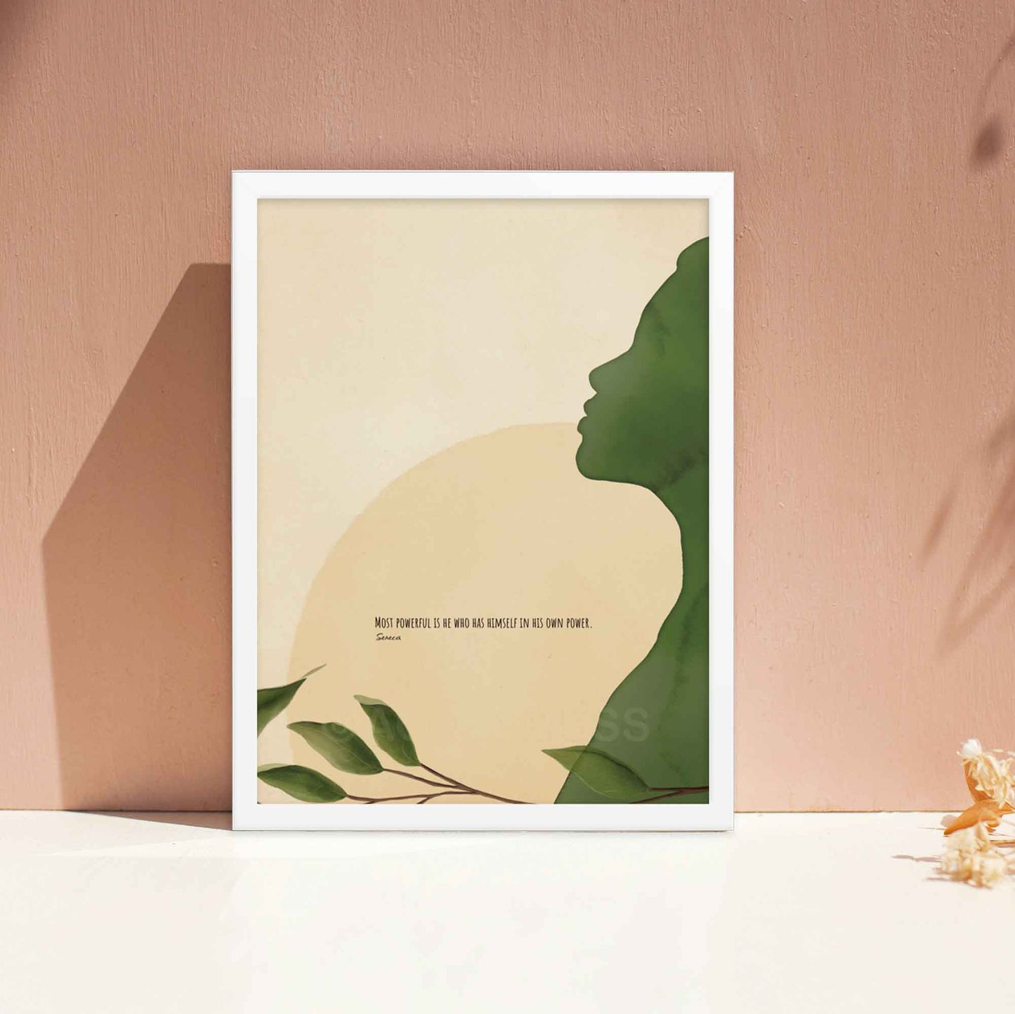 Seneca quote poster featuring the words Most powerful is he who has himself in his own power,'with a serene green, beige, and yellow illustration, displayed in white frame.