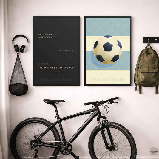 soccer wall art and marcus aurelius quote in black frame on a gallery wall