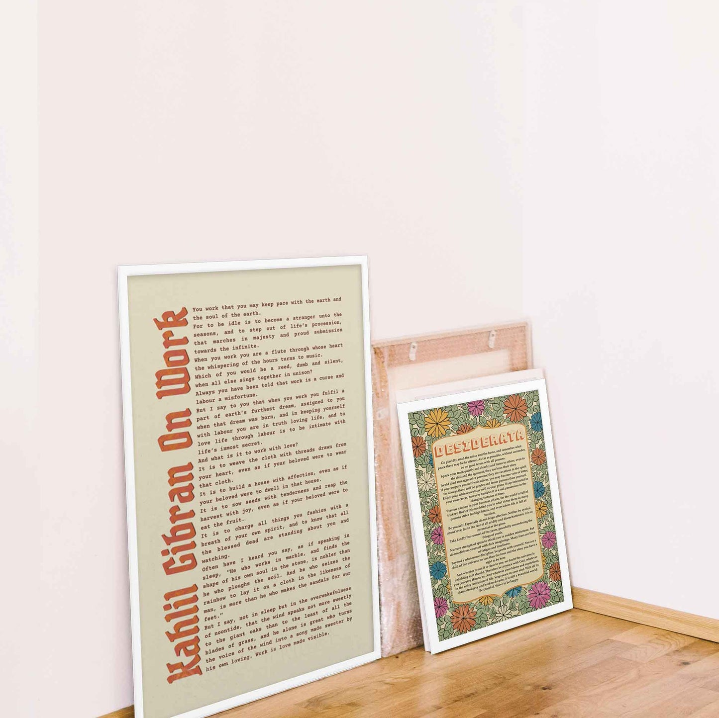 Work motivational poster by Kahlil Gibran in white frame.