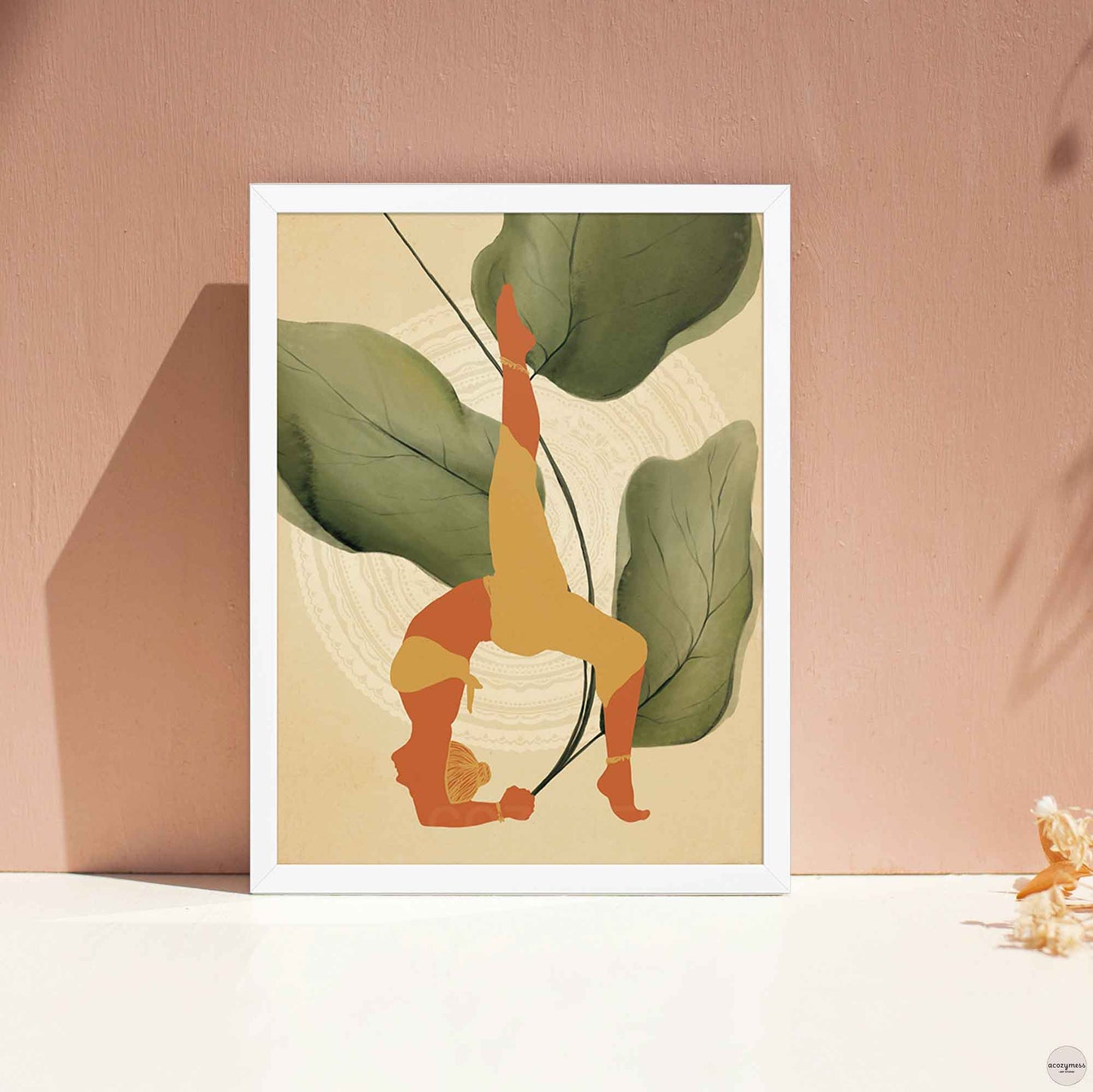 A white-framed poster featuring an illustration of a woman in a yoga pose, set against a backdrop of large leafy plants in earthy tones. The calming design reflects balance, mindfulness, and a deep connection to nature—ideal for yoga or meditation spaces.