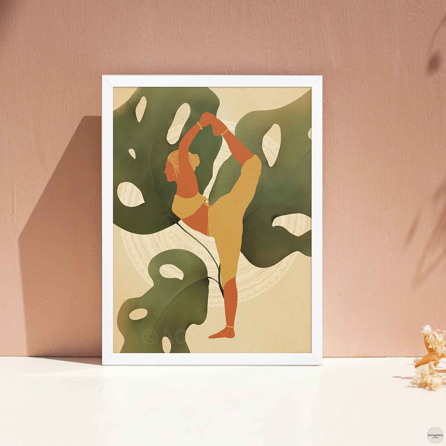 A white-framed poster featuring an illustration of a woman in a yoga pose, set against a backdrop of large leafy plants in earthy tones. The calming design reflects balance, mindfulness, and a deep connection to nature—ideal for yoga or meditation spaces.