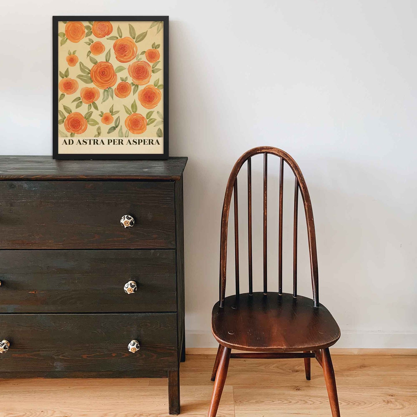 Latin phrase poster featuring an inspiring Latin phrase, Ad Astra Per Aspera, with elegant floral art, perfect for adding motivation and charm to your home or office decor, in black frame