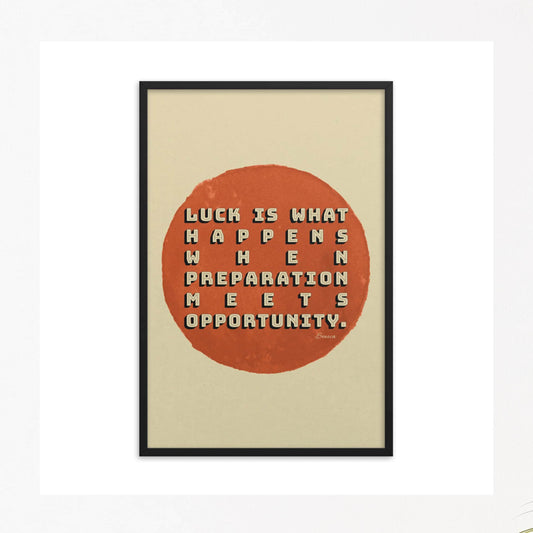 Seneca quote on luck in beige & red poster in black frame.