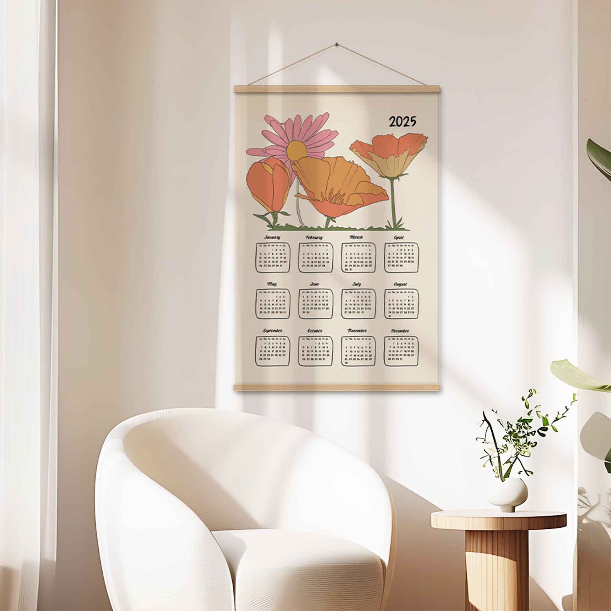 2025 yearly calendar poster with an illustrated floral design, with oakwood  hanger.