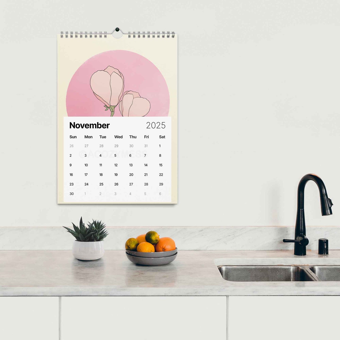 2025 monthly calendar with floral design.