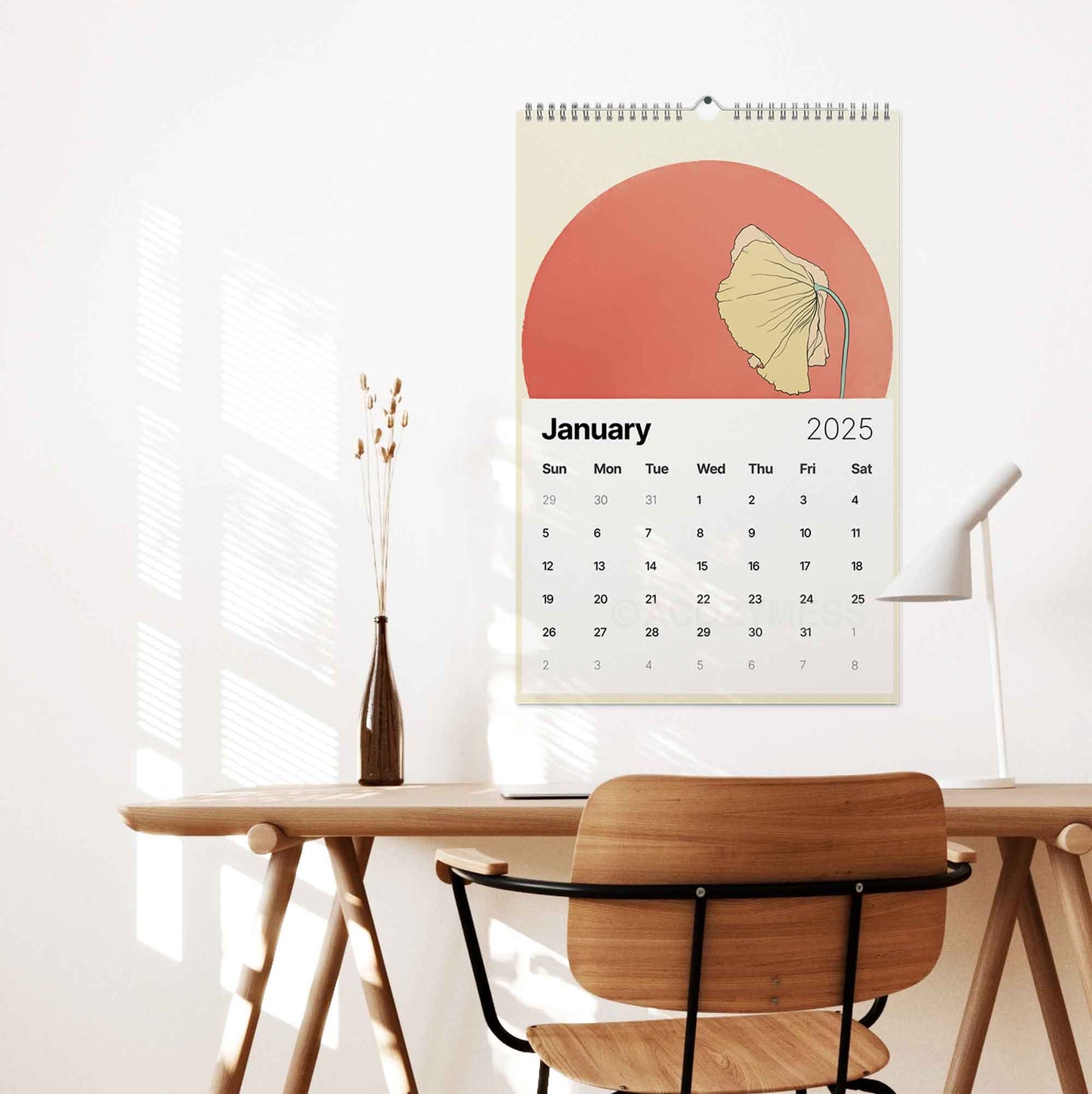 2025 monthly calendar with floral art.