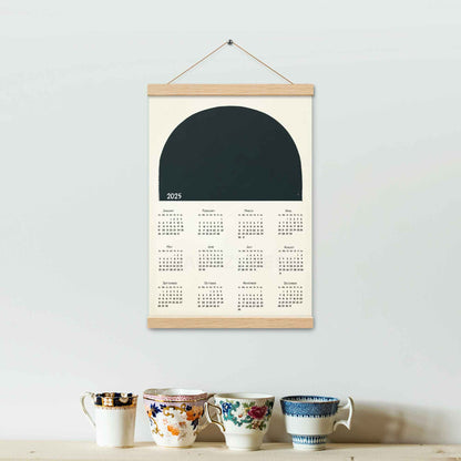 2025 yearly calendar poster with minimalist design,  with oak wood hanger, perfect for modern home or office decor.