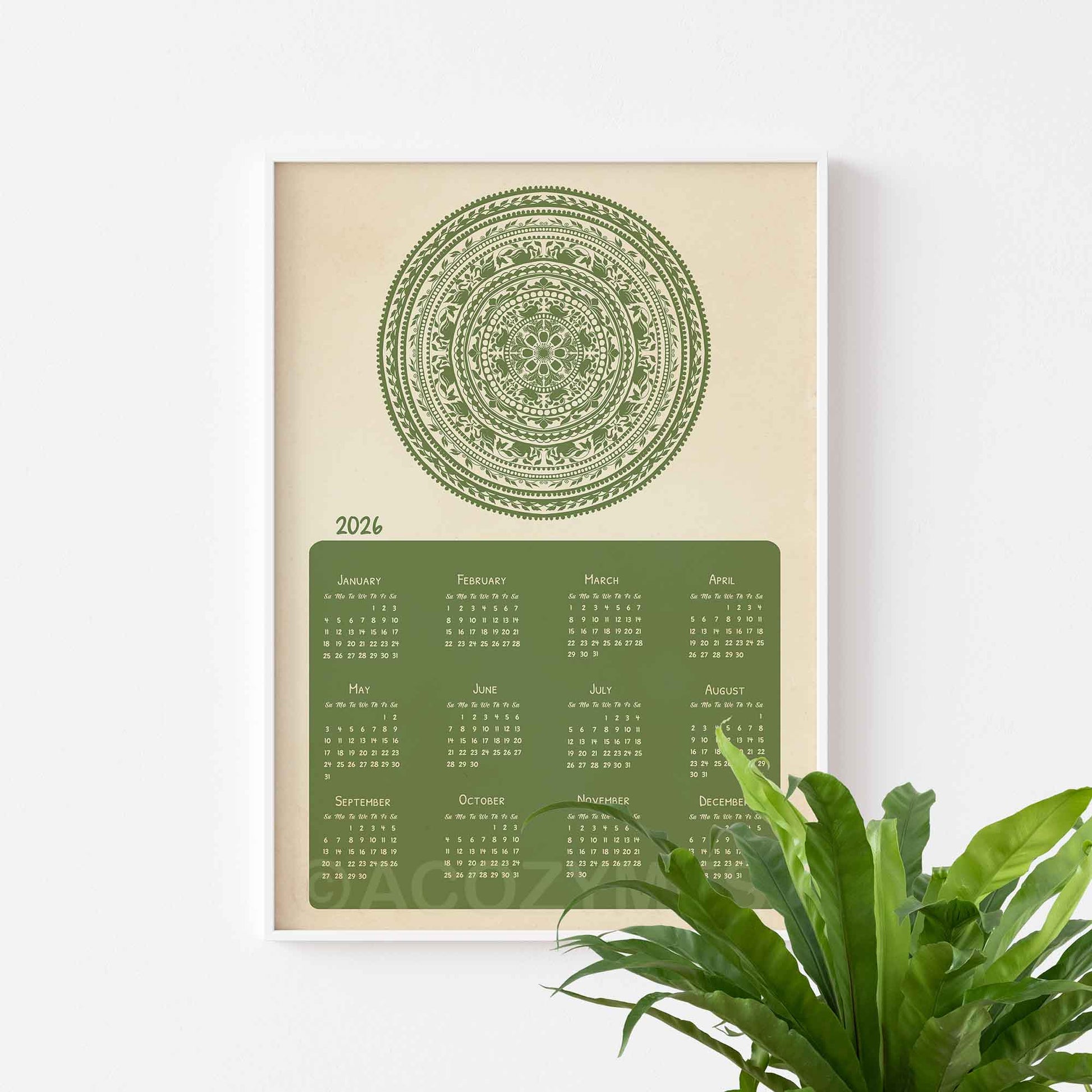 Calendar poster with green mandala design on a beige background, featuring the year 2026.