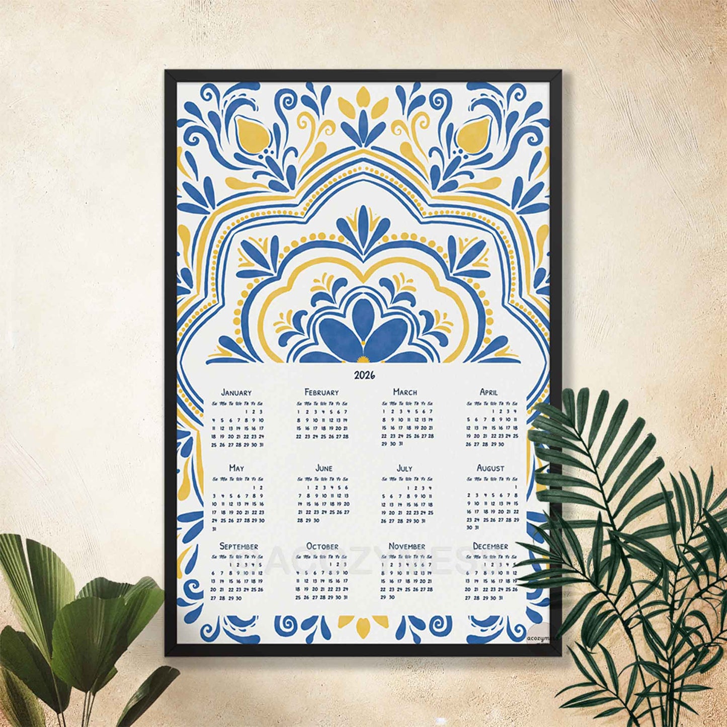 Decorative calendar with blue and yellow patterns in a black frame