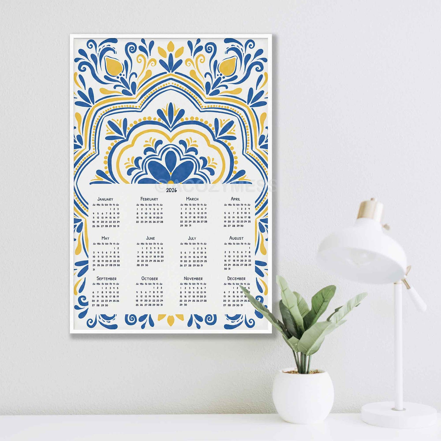 One page 2026 calendar with blue and yellow patterns in a white frame.