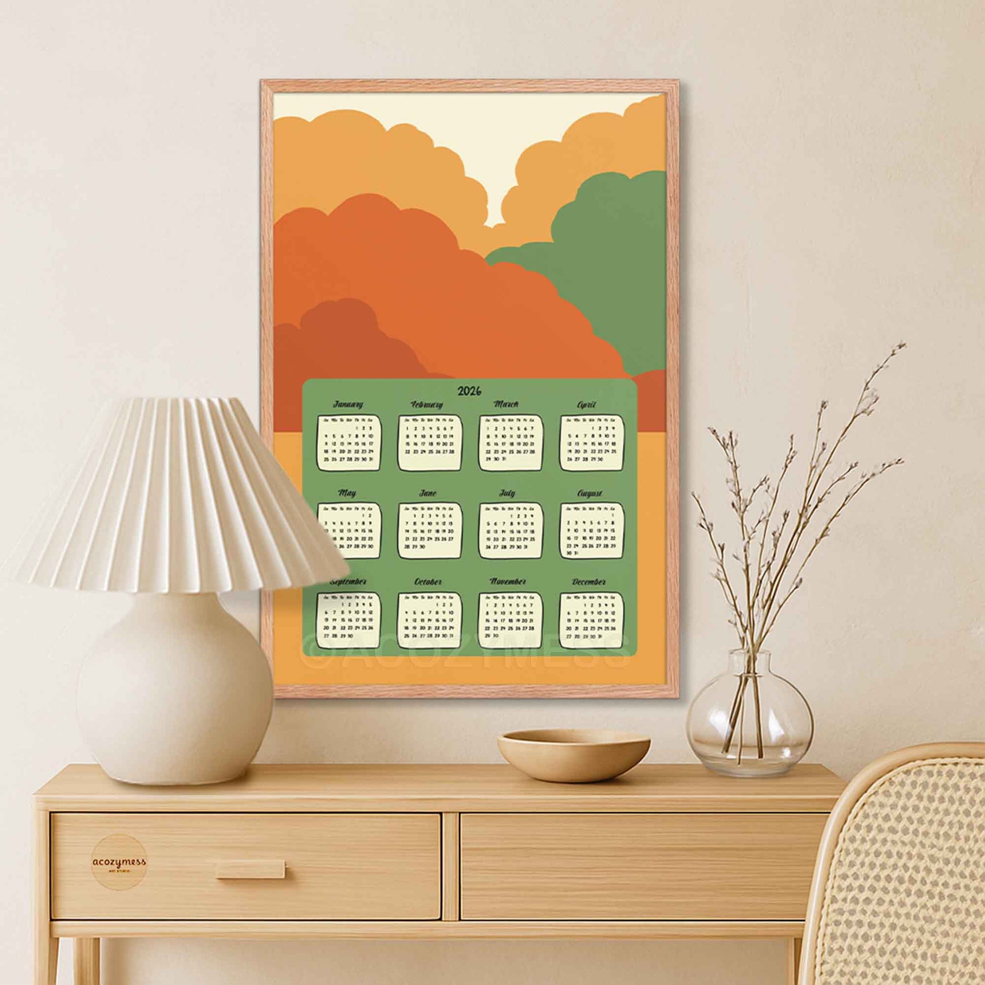 Framed calendar with colorful abstract design on a wall.