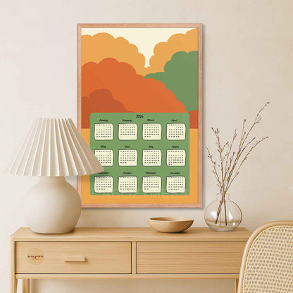 Framed calendar with colorful abstract design on a wall.