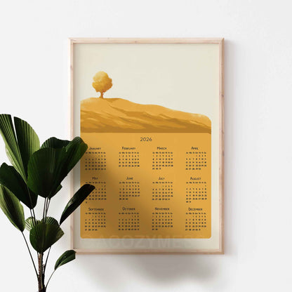 Framed calendar with a tree design on a white wall