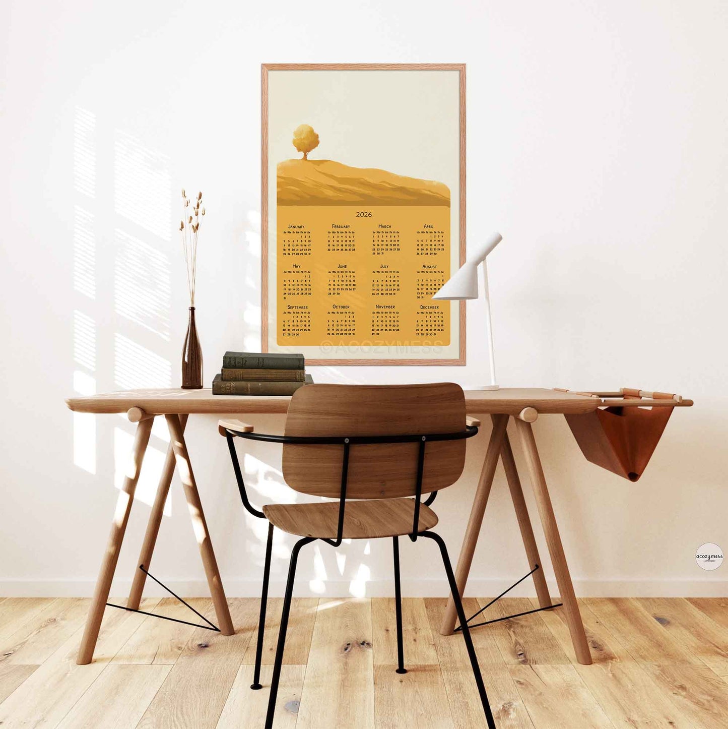 large 2026 calendar with  golden yellow landscape art showcased in study or office room