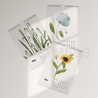 Three floral-themed wall calendars on a white background