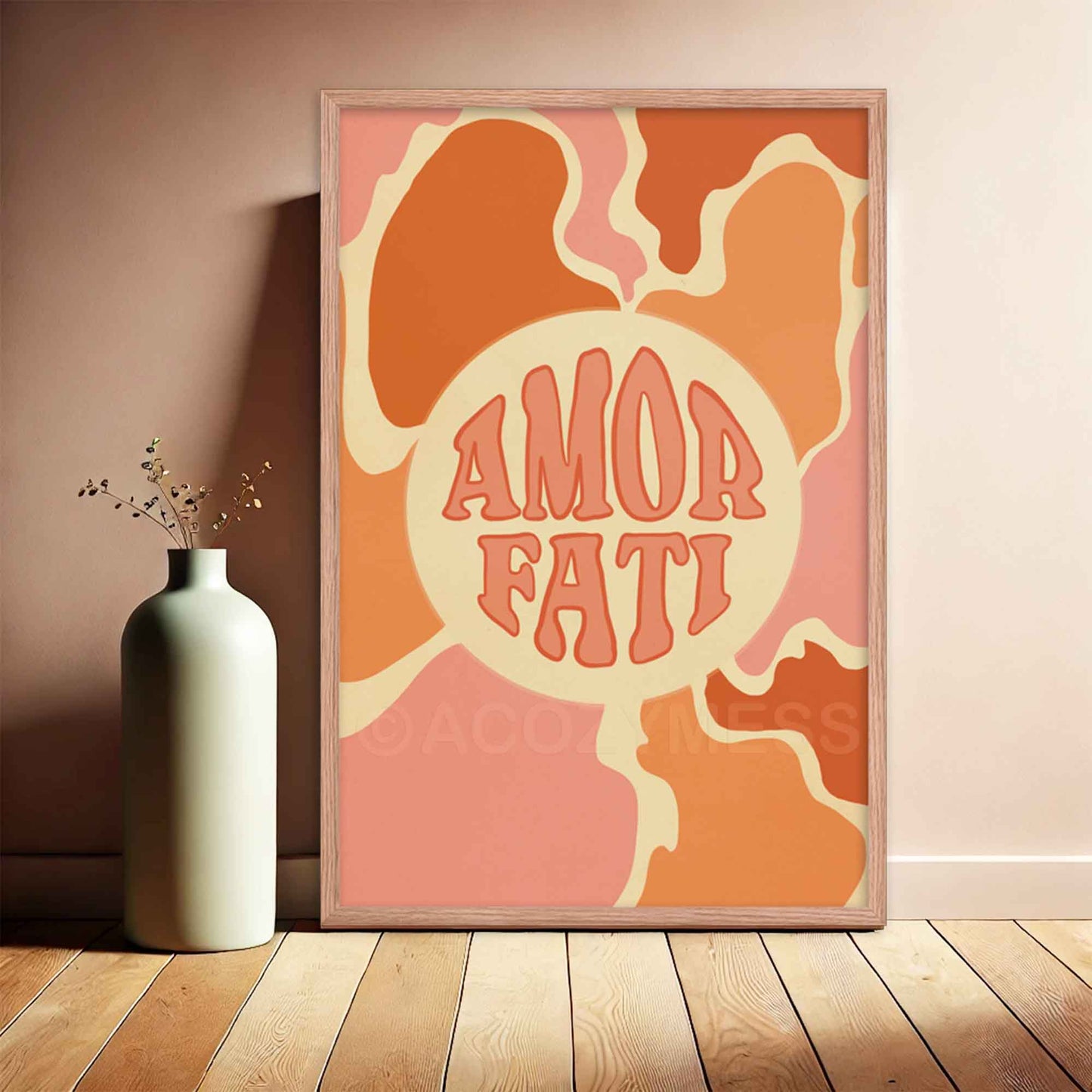 Amor Fati poster with abstract design in soft pink, orange, and beige tones, symbolizing the Stoic philosophy of loving one's fate, displayed in a oakwood frame.