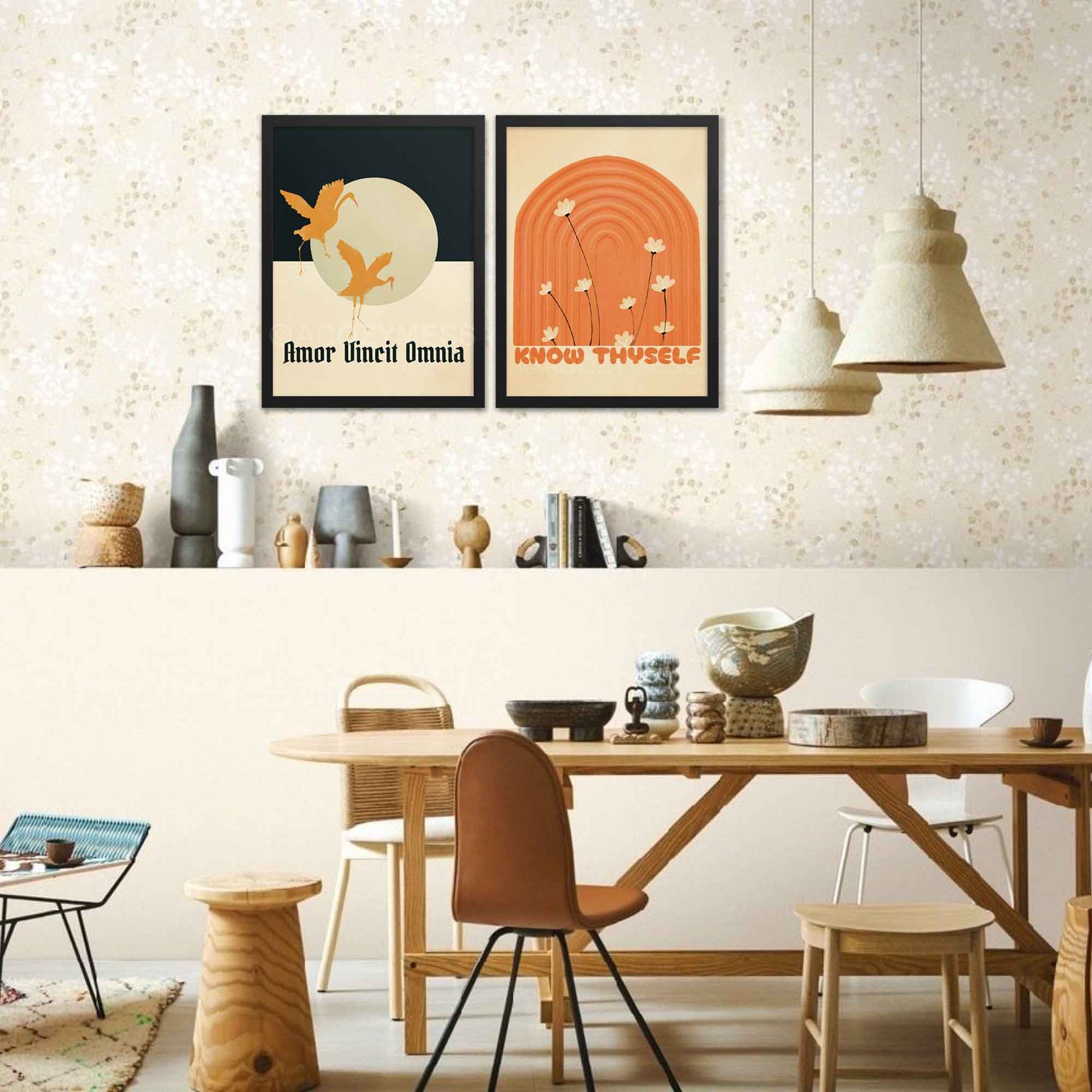 Amor Vincit Omnia Poster in beige, blue and yellow with flying birds art, framed in black, on a gallery wall.