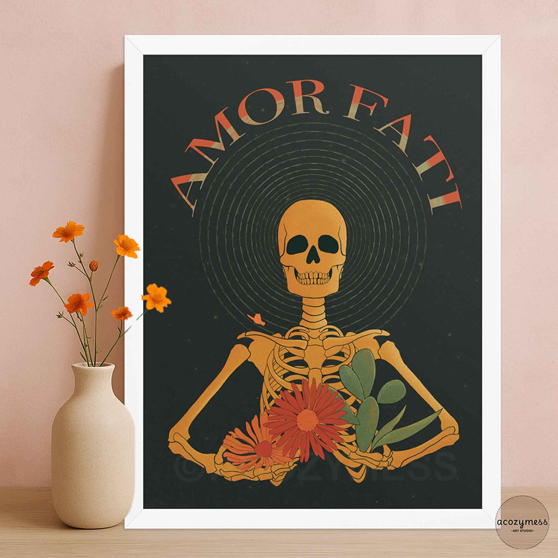 amor fati skeleton art print on dark background in white frame.