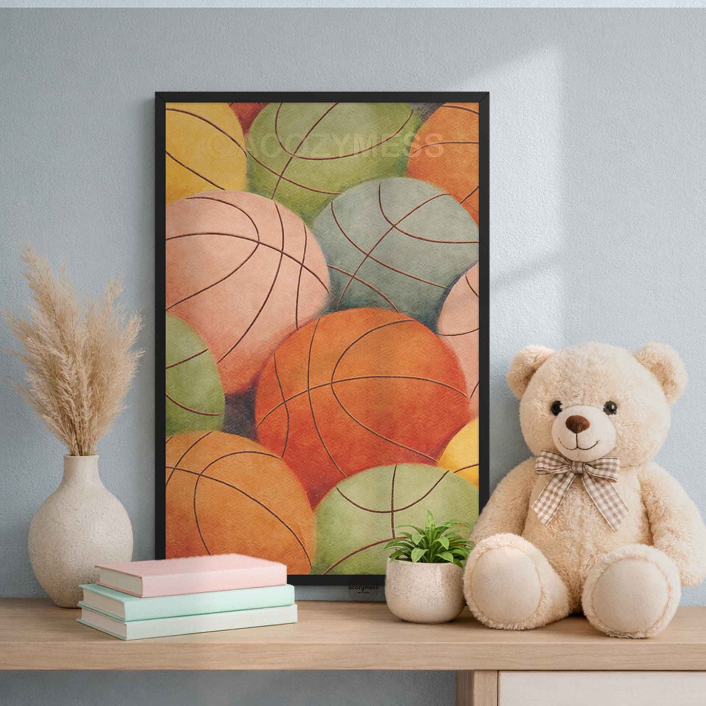 Colorful abstract art print of basketballs on a wall above a wooden shelf.