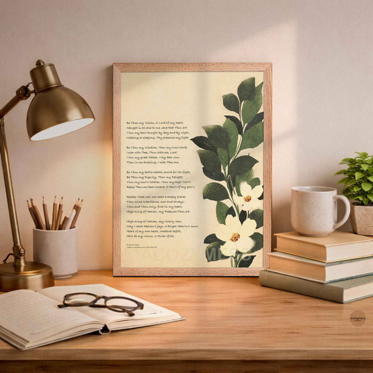 Be thou my vision art print with botanical art in oak frame displayed on an office desk.