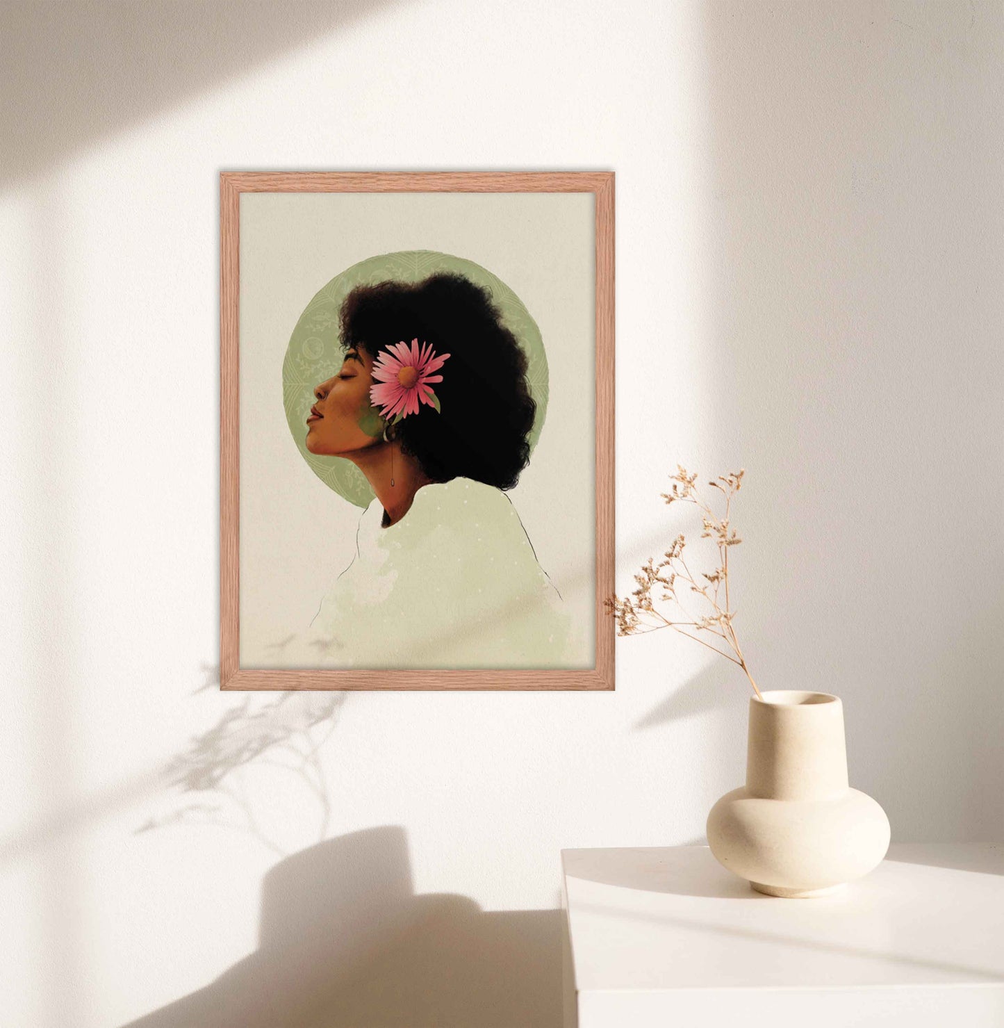 Black Woman With pink flower in her hair art print in oakwood frame