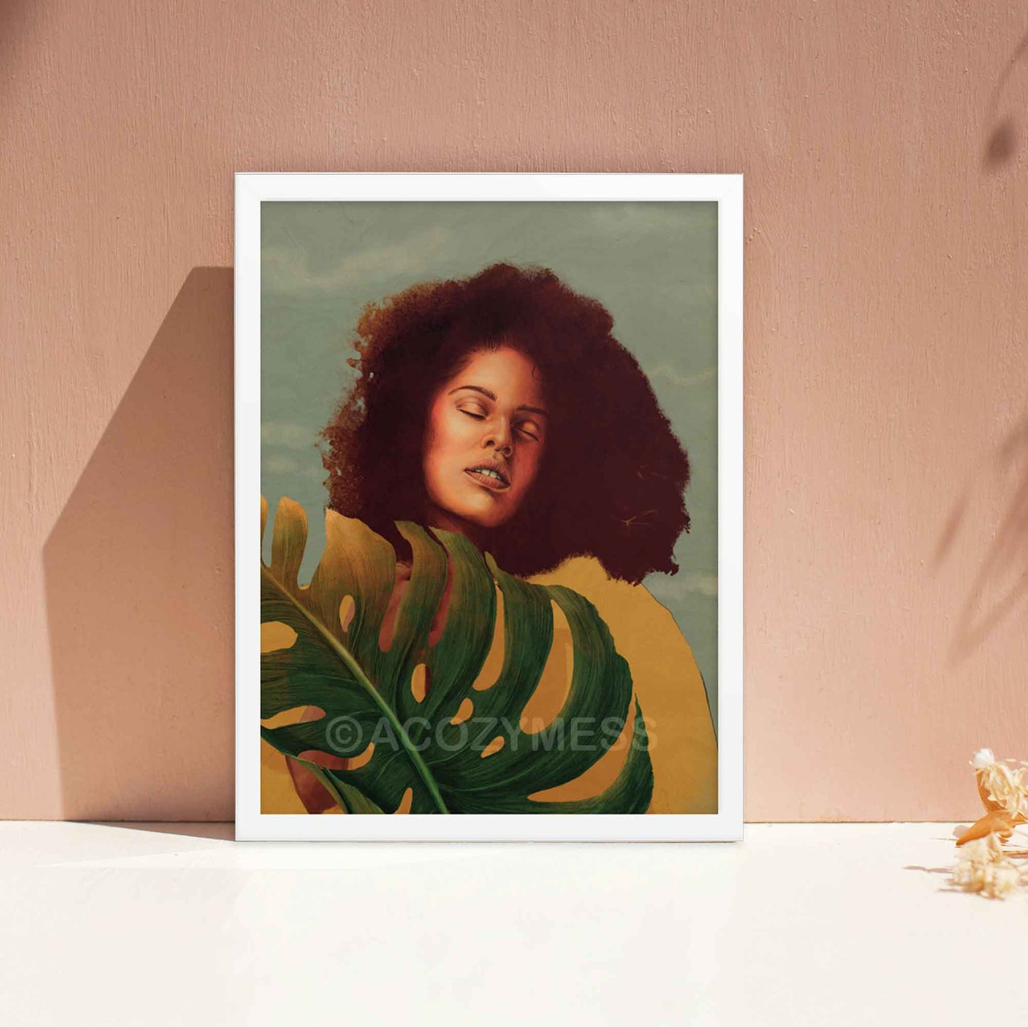 Black Woman Wall Art featuring a vibrant yellow background, confident pose, and monstera leaf in yellow, blue and green poster framed in white.